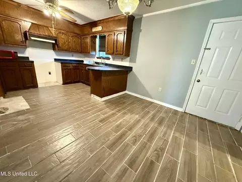 Kitchen - 312 Oak Grove Rd, Tylertown, MS 39667 photo 2 of 2