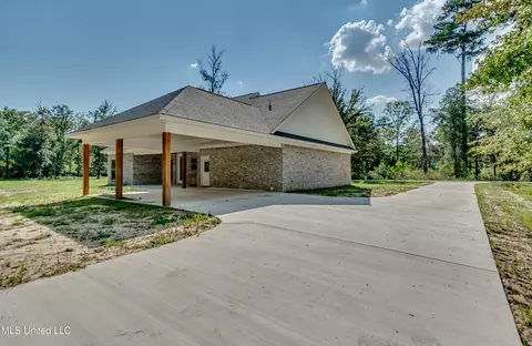 Exterior - 104 Shady Oaks Ln, Forest, MS 39074 photo 9 of 13