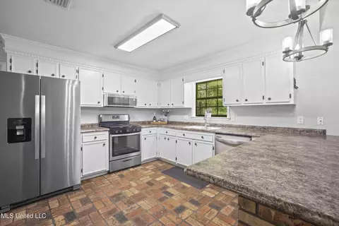 Kitchen - 13410 Haley Rd, Saucier, MS 39574 photo 1 of 3