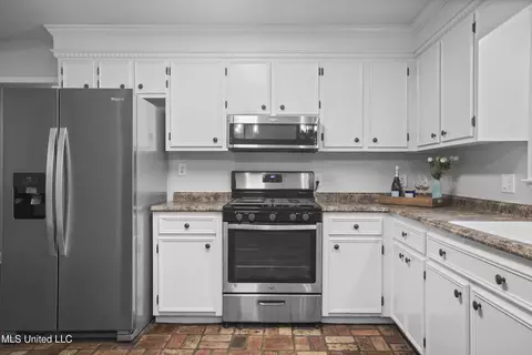 Kitchen - 13410 Haley Rd, Saucier, MS 39574 photo 2 of 3