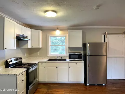 Kitchen - 614 Naylor St, Carthage, MS 39051 photo 2 of 2