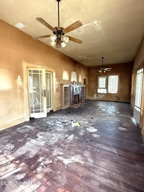 Living - 104 S First St, Osyka, MS 39657 photo 1 of 2
