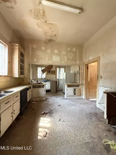 Kitchen - 104 S First St, Osyka, MS 39657 photo 3 of 4