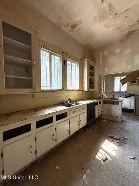 Kitchen - 104 S First St, Osyka, MS 39657 photo 1 of 4