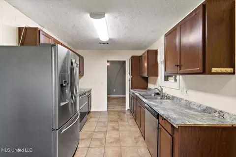 Kitchen - 605 Upper Darby Rd, Jackson, MS 39212 photo 1 of 2