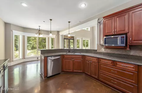 Kitchen - 875 Mccravy Rd, Hickory Flat, MS 38633 photo 3 of 4