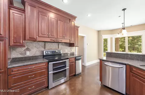 Kitchen - 875 Mccravy Rd, Hickory Flat, MS 38633 photo 2 of 4