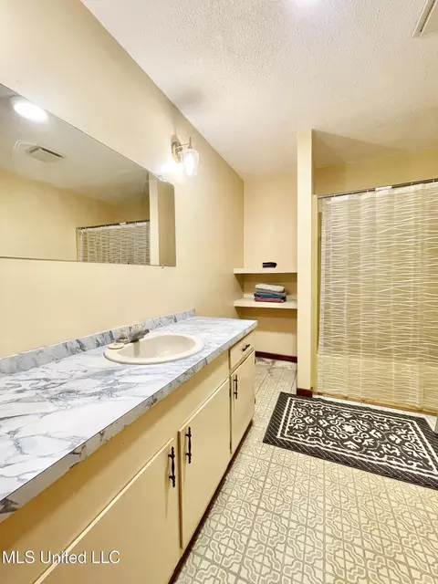 Bath - 75 Cyprus Rd, Mclain, MS 39456 photo 1 of 2