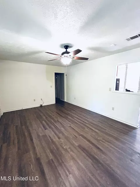 Living - 1478 Bass Ave, Jackson, MS 39212 photo 1 of 2