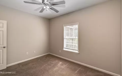 Bedroom - 2022 S Cobblestone Cv, Brandon, MS 39042 photo 6 of 10