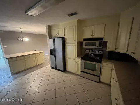 Kitchen - 506 E Liberty St, Osyka, MS 39657 photo 3 of 3