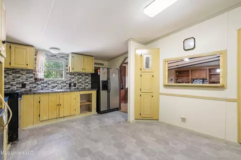 Kitchen - 62 Carlisle Rd, Sarah, MS 38665 photo 2 of 3