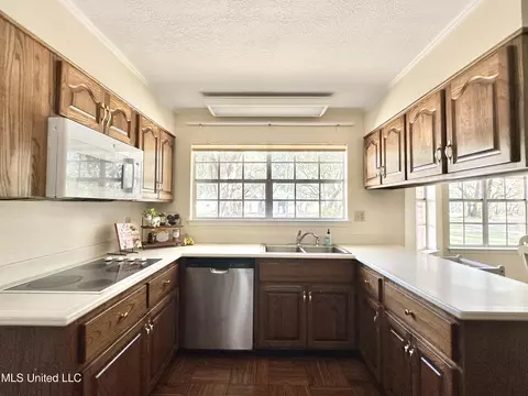 Kitchen - 6001 Wooded Acres Rd, Vancleave, MS 39565 photo 2 of 2