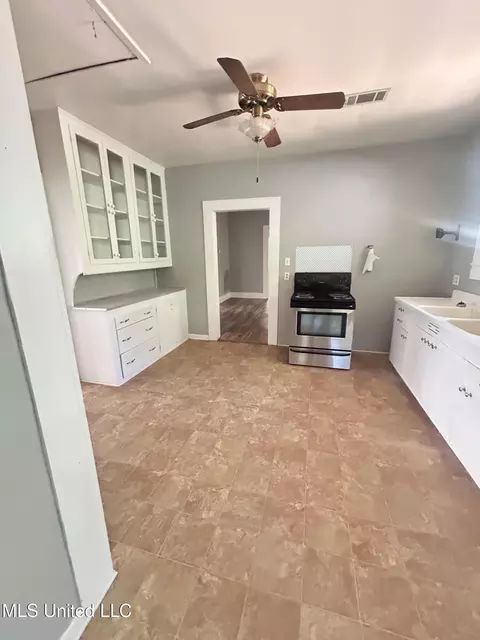 Kitchen - 505 S Magnolia St, Summit, MS 39666 photo 2 of 2