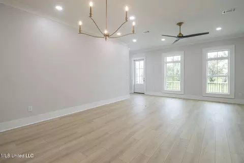 Living - 105 E 2nd St, Pass Christian, MS 39571 photo 1 of 2