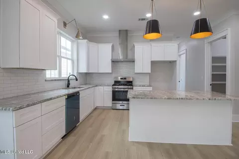 Kitchen - 105 E 2nd St, Pass Christian, MS 39571 photo 1 of 1