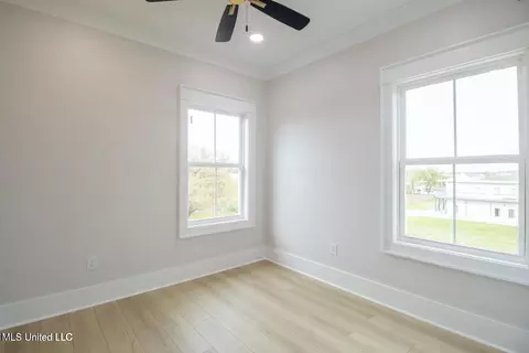 Bedroom - 105 E 2nd St, Pass Christian, MS 39571 photo 2 of 4