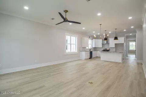 Living - 105 E 2nd St, Pass Christian, MS 39571 photo 2 of 2