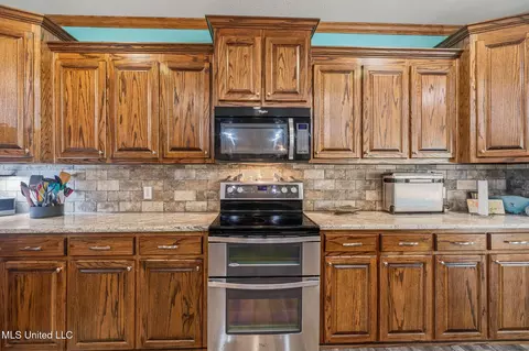 Kitchen - 2027 Chapel Dr, Summit, MS 39666 photo 3 of 5