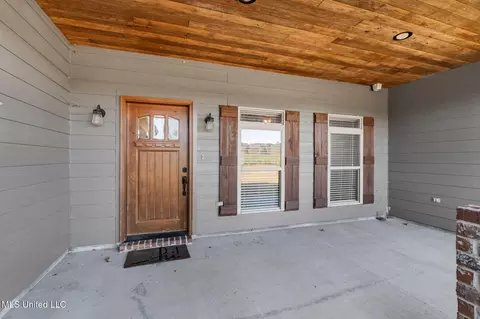 Exterior - 2027 Chapel Dr, Summit, MS 39666 photo 6 of 11