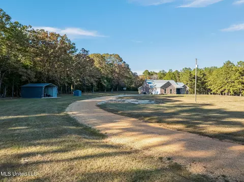 Exterior - 2027 Chapel Dr, Summit, MS 39666 photo 3 of 11