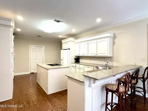 Kitchen - 306 Cherokee Dr, Mccomb, MS 39648 photo 2 of 7