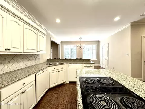 Kitchen - 306 Cherokee Dr, Mccomb, MS 39648 photo 6 of 7