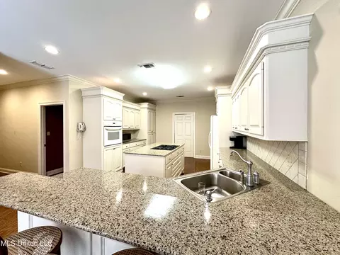 Kitchen - 306 Cherokee Dr, Mccomb, MS 39648 photo 4 of 7