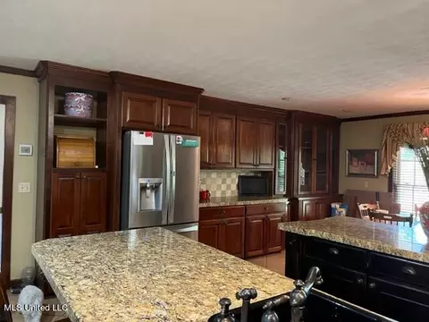 Kitchen - 1360 Airport Rd, Magee, MS 39111 photo 2 of 4