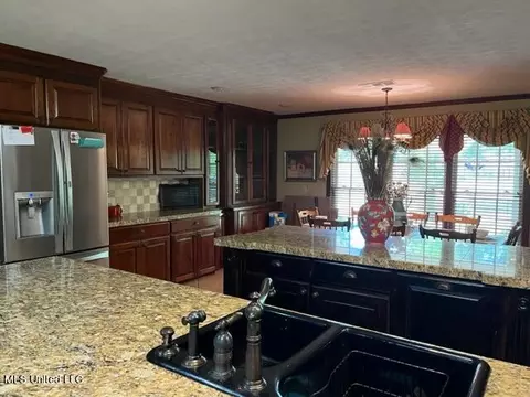 Kitchen - 1360 Airport Rd, Magee, MS 39111 photo 1 of 4