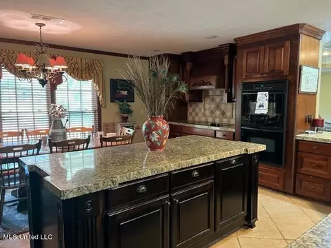 Kitchen - 1360 Airport Rd, Magee, MS 39111 photo 3 of 4