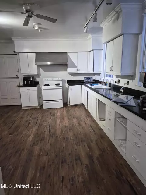 Kitchen - 401 E First St, Forest, MS 39074 photo 1 of 2
