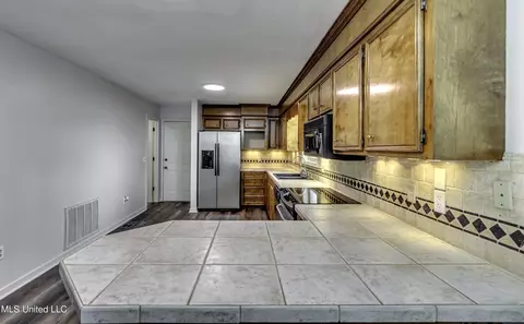 Kitchen - 133 Monmouth Rd, Florence, MS 39073 photo 2 of 5