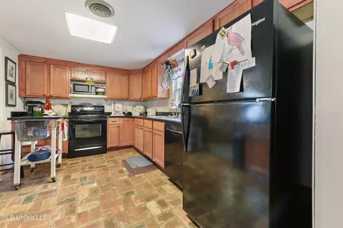 Kitchen - 117 Cedar St, Lucedale, MS 39452 photo 1 of 2