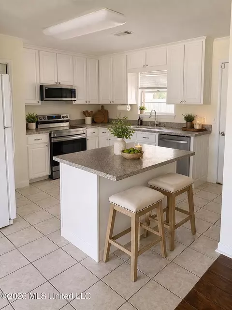 Kitchen - 103 Reeves St, Long Beach, MS 39560 photo 3 of 3