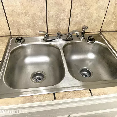 Kitchen - 359 Cummins St, Jackson, MS 39204 photo 10 of 10