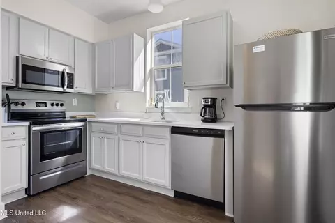 Kitchen - 215 E 2nd St #6, Pass Christian, MS 39571 photo 3 of 4