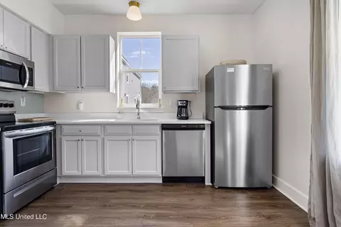 Kitchen - 215 E 2nd St #6, Pass Christian, MS 39571 photo 2 of 4