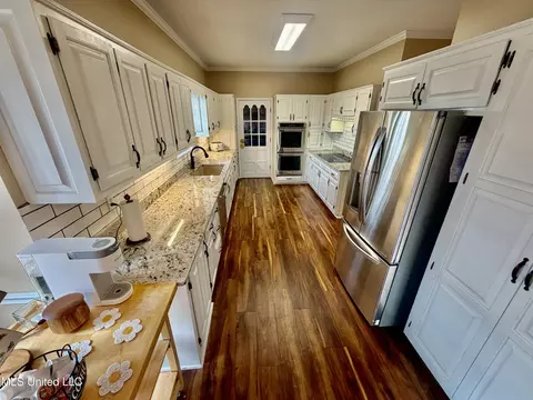Kitchen - 407 Juniper Ln, Ruleville, MS 38771 photo 2 of 3