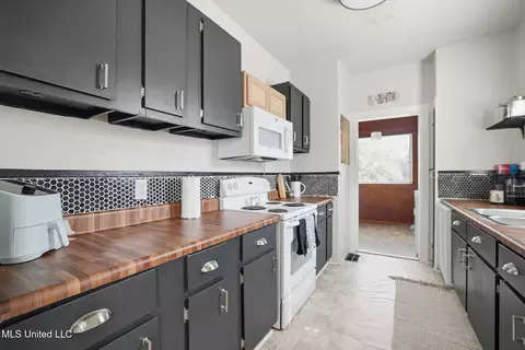 Kitchen - 415 S 5th St, Mccomb, MS 39648 photo 1 of 2