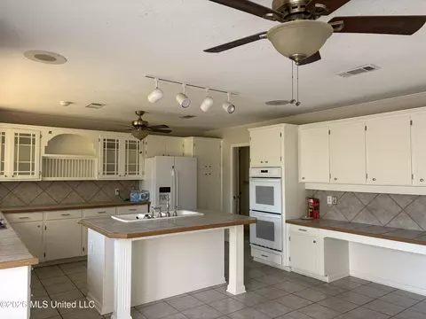 Kitchen - 348 Old Magee Rd, Magee, MS 39111 photo 2 of 5