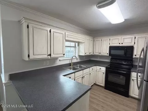 Kitchen - 602 Madeline Cv, Florence, MS 39073 photo 2 of 3
