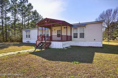 Exterior - 62 John Ramsey Rd, Wiggins, MS 39577 photo 1 of 10