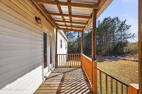 Exterior - 62 John Ramsey Rd, Wiggins, MS 39577 photo 2 of 10