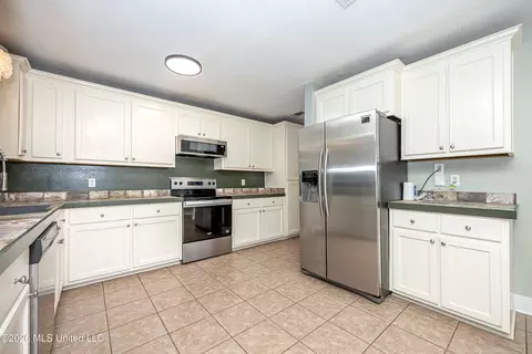 Kitchen - 21455 Edgewood Dr, Saucier, MS 39574 photo 4 of 5