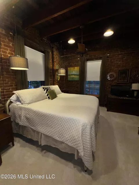 Bedroom - 303 N Commerce St, Natchez, MS 39120 photo 1 of 4