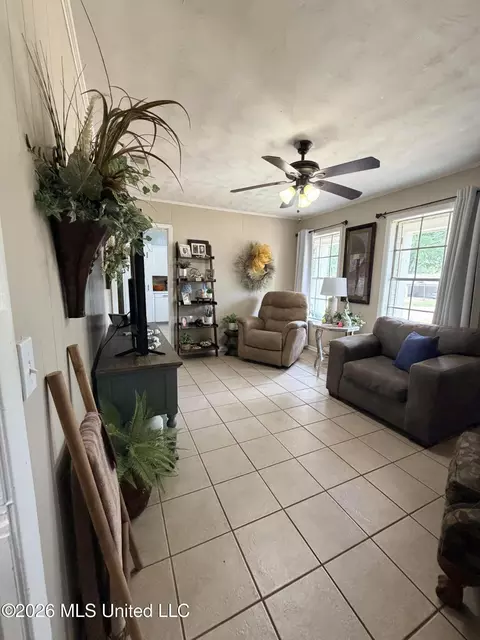 Living - 502 NW Kennedy Dr, Magee, MS 39111 photo 2 of 2