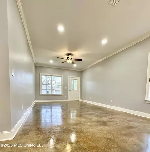 Living - 225 SE 7th Ave, Magee, MS 39111 photo 1 of 2