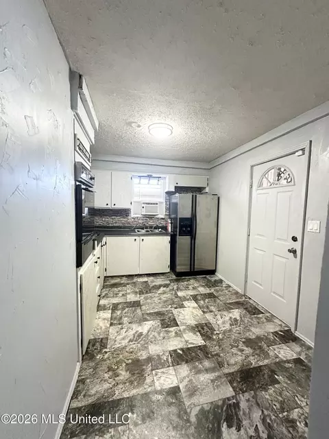 Kitchen - 57 S Main St, Holcomb, MS 38940 photo 1 of 2
