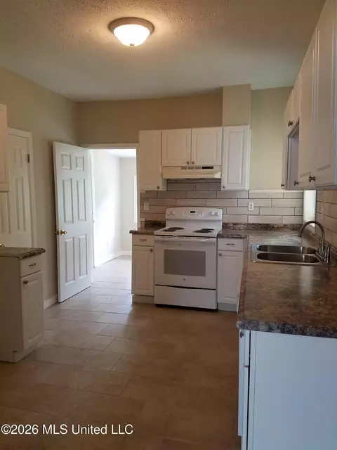 Kitchen - 103 E Sproles St, Clinton, MS 39056 photo 2 of 2